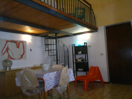 Appartamento Arancio - Il soggiorno e il soppalco